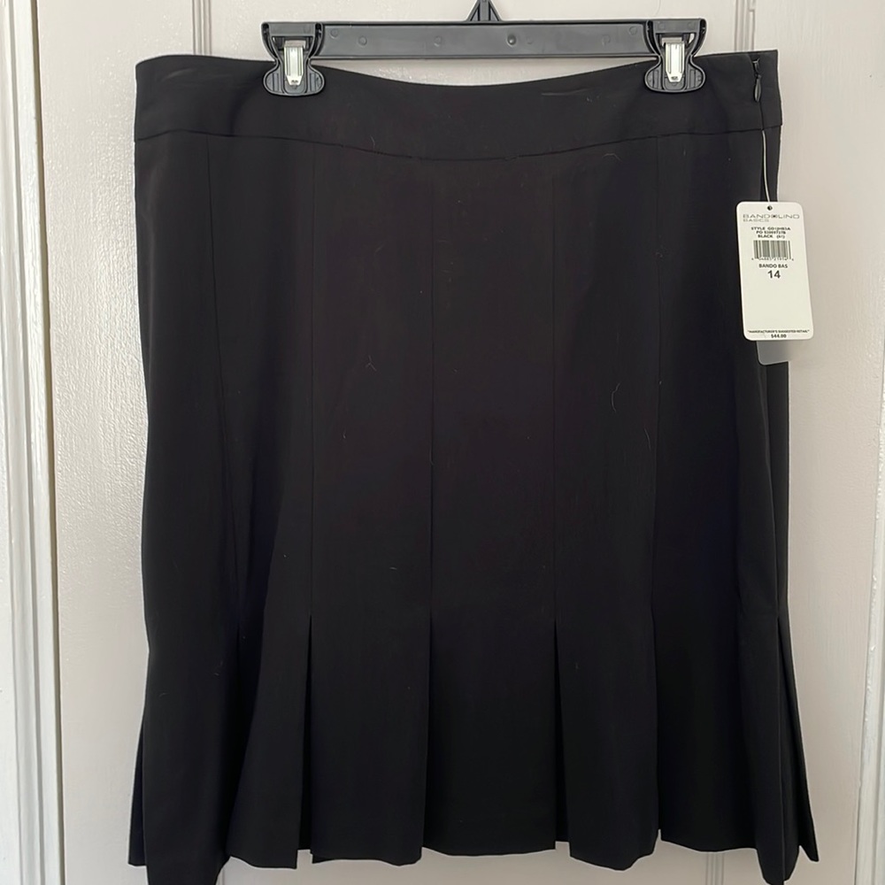 Brand new with tags. Zipper on the side
